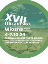 Festival poster - information about the event in a green circle.
