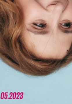 Festival poster: a photo of a woman's face upside down.