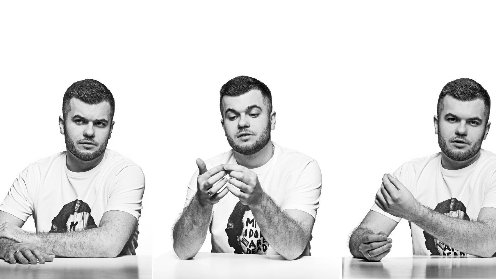 3 black and white photos of Łukasz Ojdana, gesturing with his hands with various facial expressions - grafika artykułu