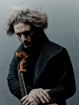 Photo of the artist Nicolas ALTSTAEDT - a pensive man leaning on a cello