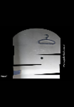 Clothes hanger on a gray wall on a black background