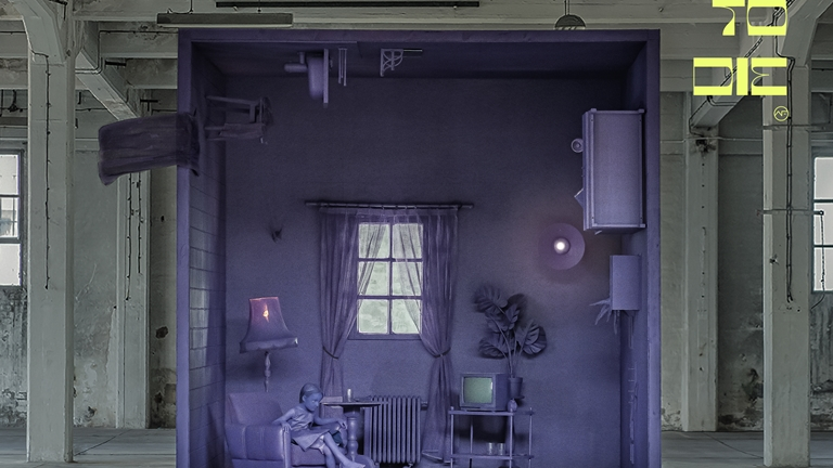 An album cover - a violet box in an empty grey building interior. The violet box imitates a room interior - a woman sitting an an arm-chair in front of an old-fashioned TV set. A standing lamp behind an arm-chair, a window wirh thin curtains and some other pieces of furniture.