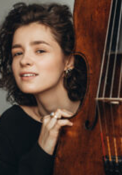A photo of the artist - a young woman by a cello