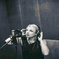 Black and white photo of the singer.