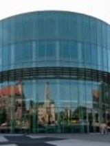 Photo of a round, glazed building