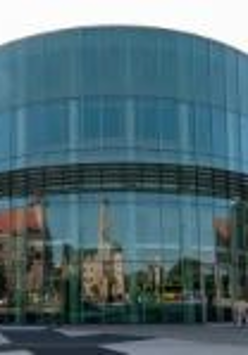 Photo of a round, glazed building