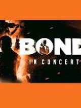 Event poster - white inscription (title of the concert) on black and orange background. On the left - black silhouette of James Bond