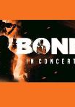 Event poster - white inscription (title of the concert) on black and orange background. On the left - black silhouette of James Bond