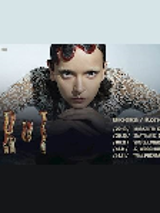 Concert poster - photo of the singer and information about the concert