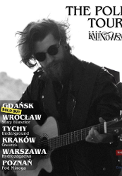BLack and white photo of a man with a guitar and information about concert tour.