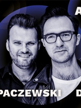 Concert poster in blue colours: photo of two men, Aleksander Dębicz and Łukasz Kuropaczewski.