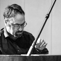 Black and white photo of Jonathan Powell.