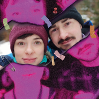 Photo of a woman and a man in winter hats.