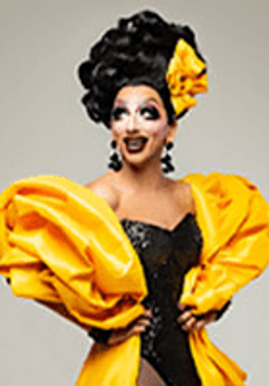 Photo of the artist dressed in yellow and black costume