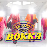 Colourful concert poster: four people in red and orange clothes with light instead of their heads.