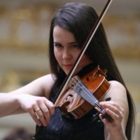 Photo of the artist - Anna Ziółkowska playing the violin