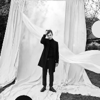 Black and white photo of the artist