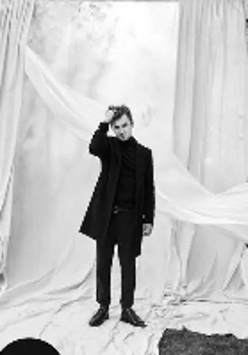 Black and white photo of the artist