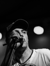 Black and white photo of the artist