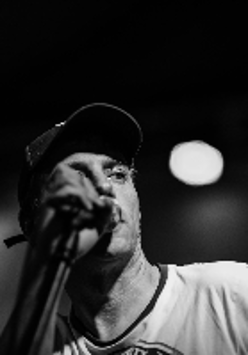 Black and white photo of the artist