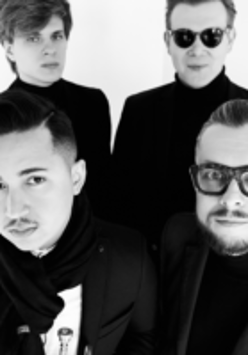 Blank and white photo of concert performers