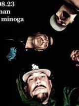 Photo of four members of the band's faces. Black backgroud.