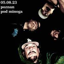 Photo of four members of the band's faces. Black backgroud.