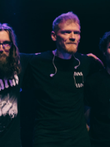 Photo of the band Dziwna Wiosna - three men standing next to each other.