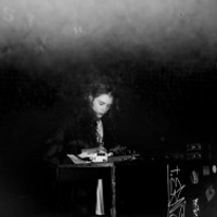 Black and white photo of the artist, Elvin Brandhi.