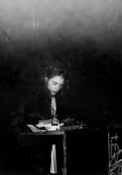Black and white photo of the artist, Elvin Brandhi.