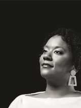 Black and white photo of the artist.