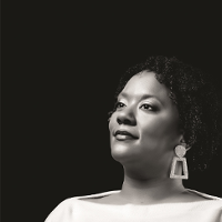 Black and white photo of the artist.