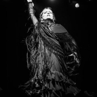 Black and white photo of one of the performers.