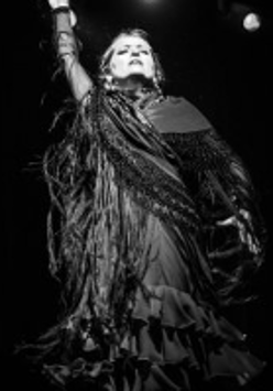 Black and white photo of one of the performers.