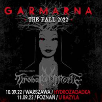 Concert poster in black and red colours with information about the event.