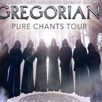 Photo of the Gregorian choir members - men in monk's habits standing next to each other in line.