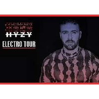 Concert poster: photo og Grzegorz Hyży and information about the event.