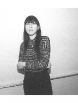 Black and white photo of the artist