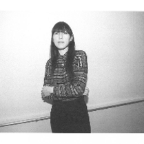 Black and white photo of the artist