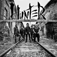 Black and white photo of the band.