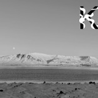 Black and white photo of snowy, severe landscape.