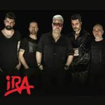 Photo of the band: five man standing, dressed in black clothes. Black background.