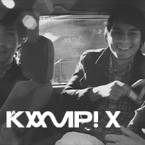 Black and white photo of the band members.