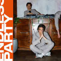 Photo of three men: one is sitting in front of a sideboard, one is laying on it and one is standing behind it. On the left side the title of the concert tour.