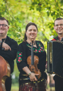 Three musicians - one woman and two men; each of them is holding a musical instrument.