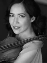 Black and white photo of the artist.