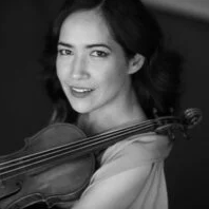 Black and white photo of the artist.