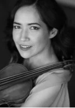 Black and white photo of the artist.