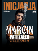 Concert poster - photo of the artist with a guitar.