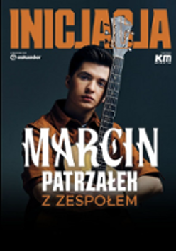 Concert poster - photo of the artist with a guitar.